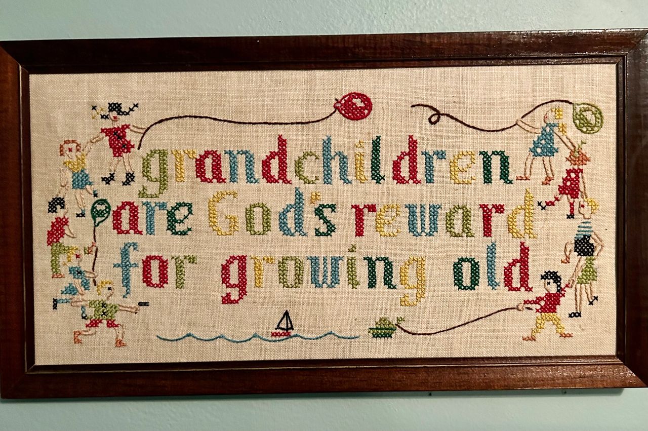 Grandchildren are God's reward for growing old. vintage cross-stitch.