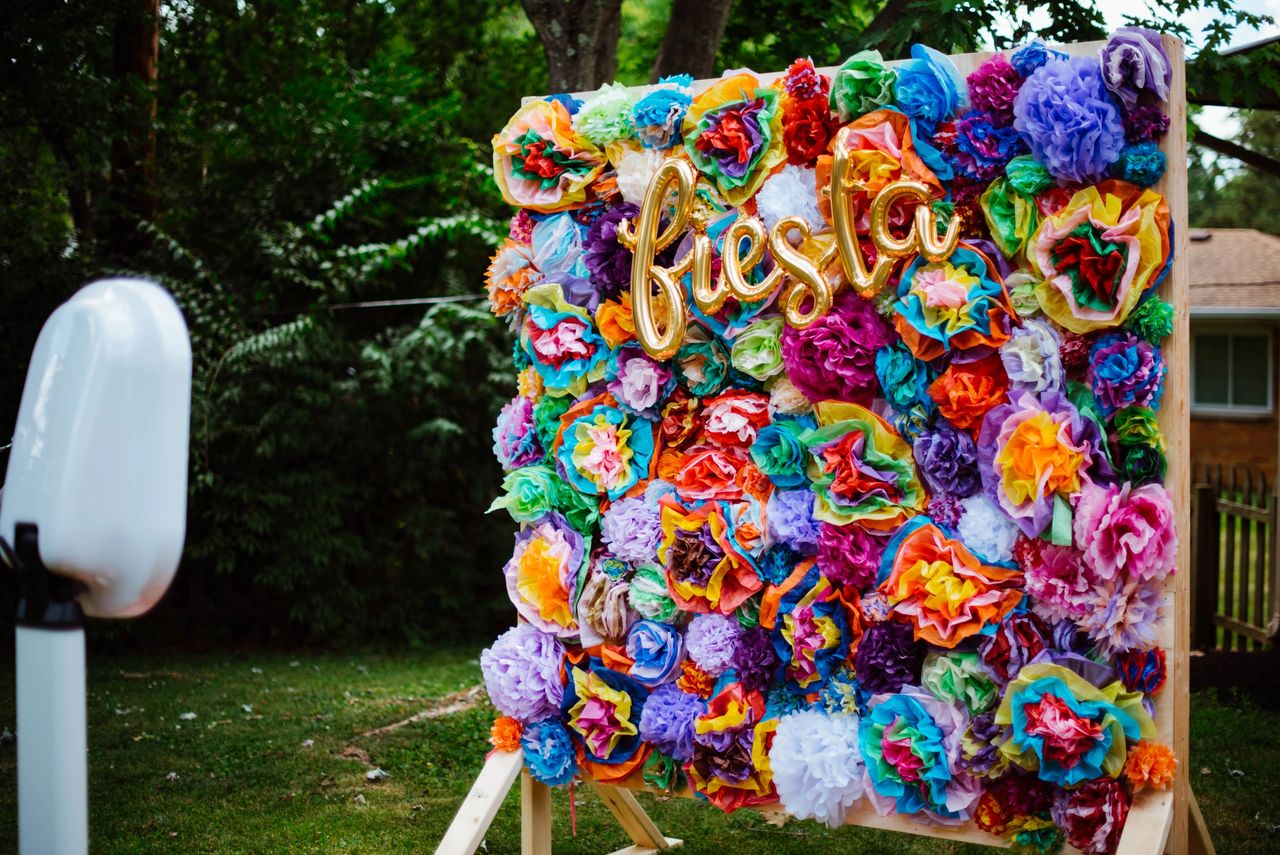 A plywood base became the foundation for hundreds of tissue paper flowers.