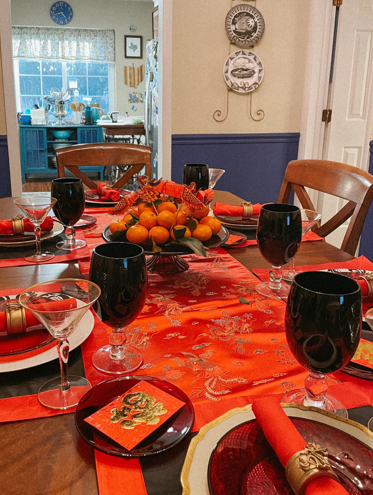Red, gold and black table decor for Chinese New Year.
