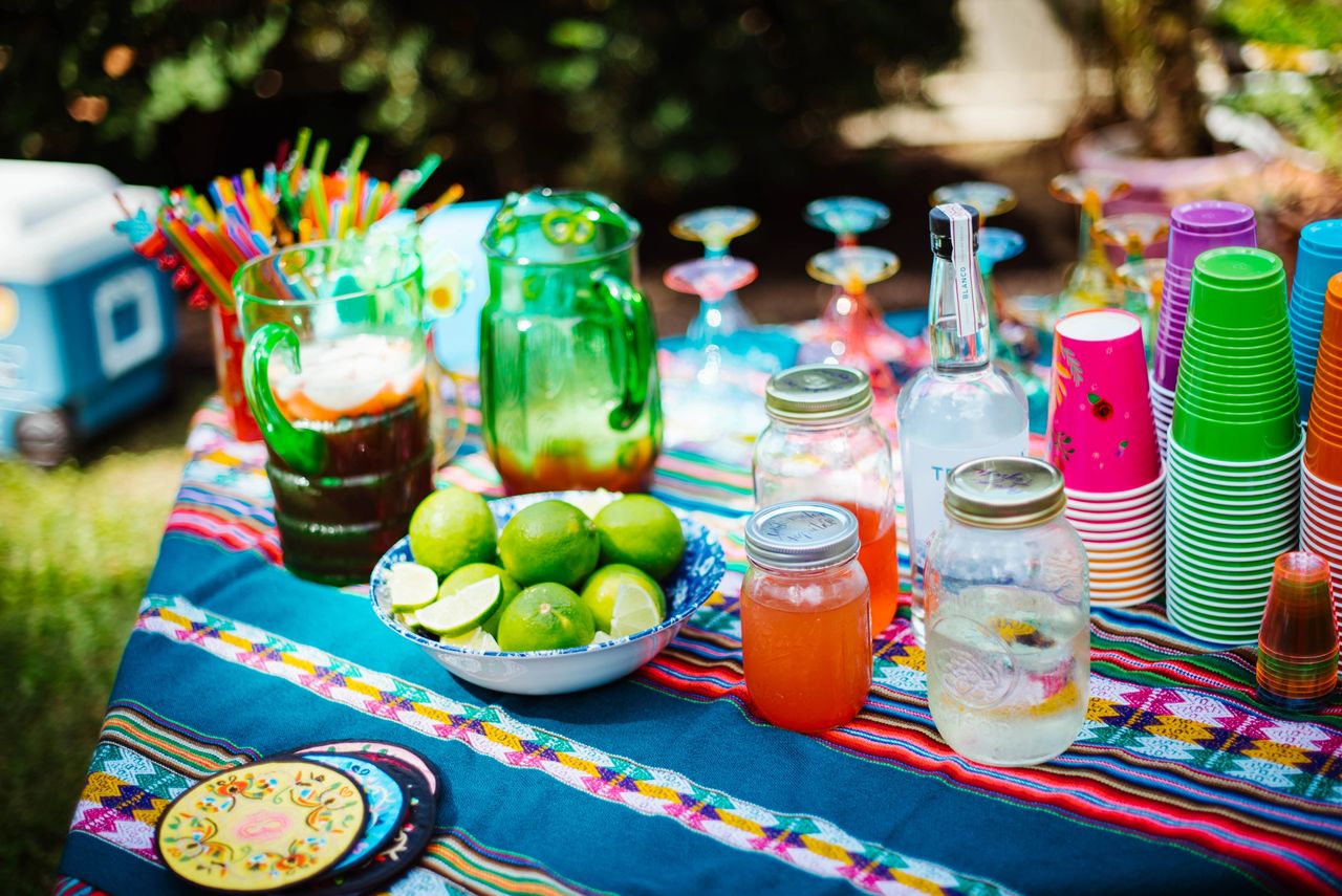 Homemade infused tequilas and fresh juices create a fun do-it-yourself margarita bar. Claire Keathley Photography