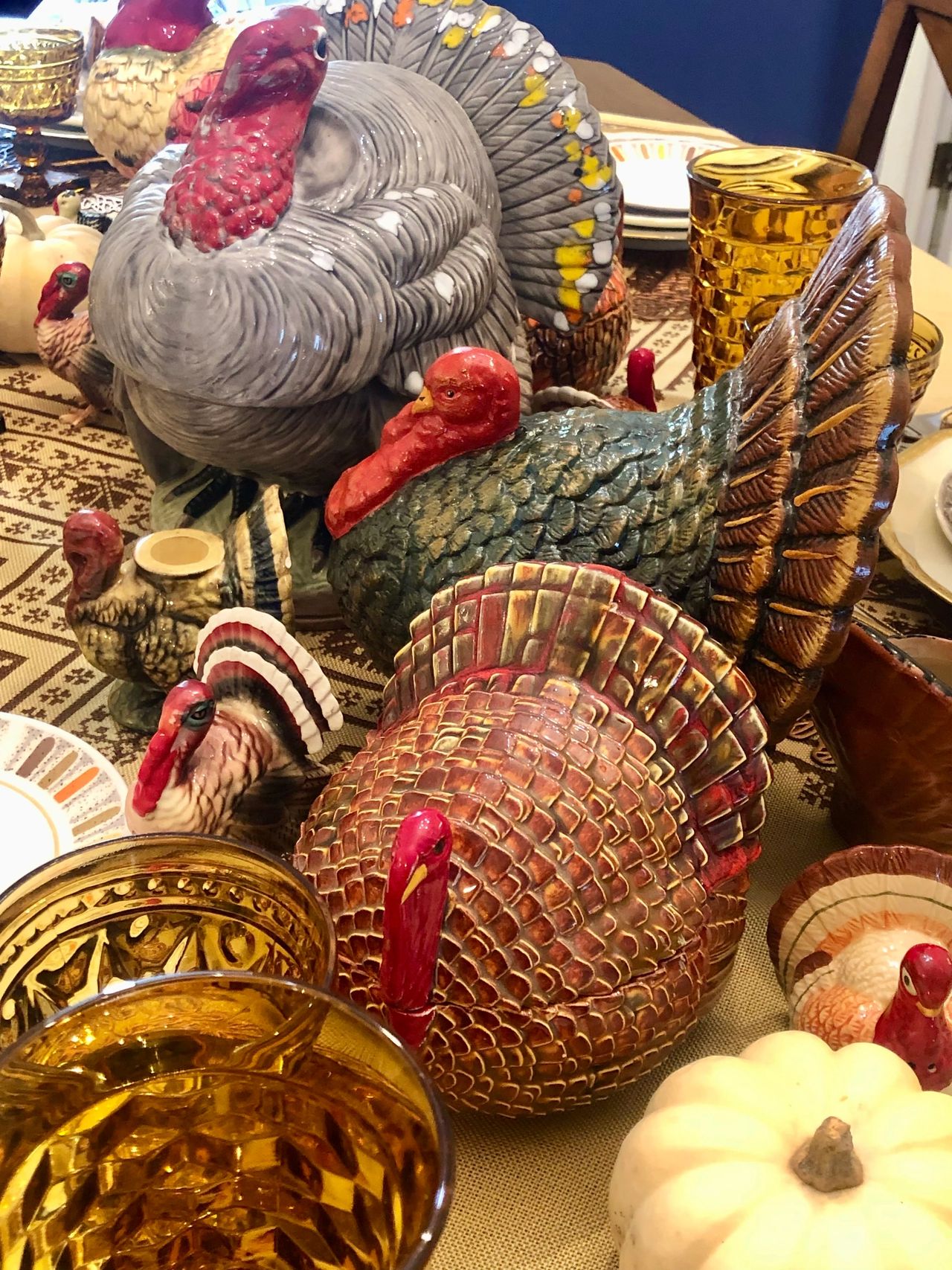 Ceramic turkeys lined up on a table