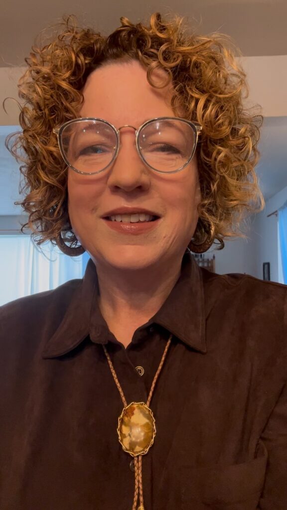 Woman showing how to wear a bolo tie