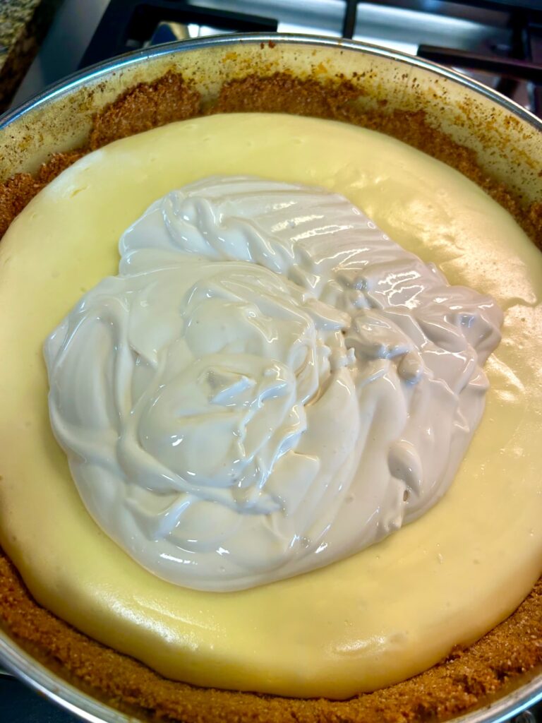 Sour cream layer on top of cheesecake